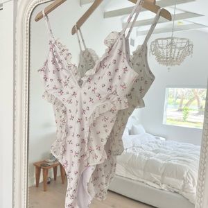 Chaser ruffle one piece bathing suit. Never worn.